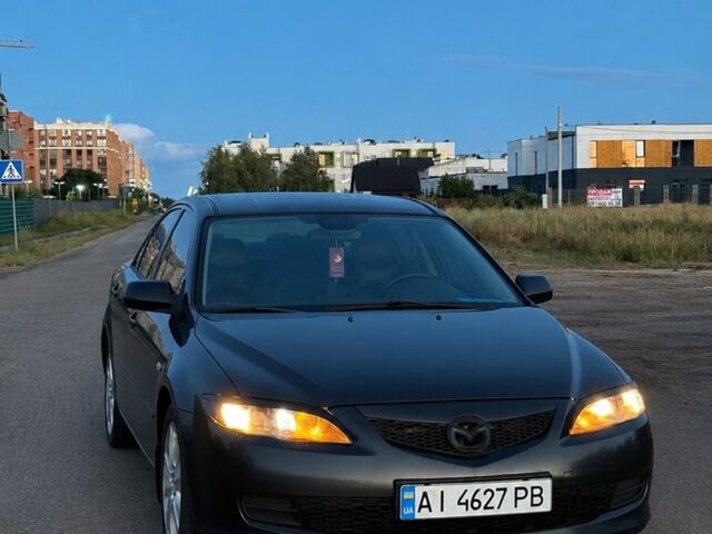 Черный Мазда 6, объемом двигателя 2 л и пробегом 313 тыс. км за 3503 $, фото 1 на Automoto.ua