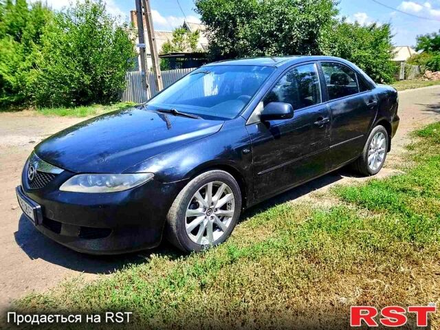 Черный Мазда 6, объемом двигателя 2 л и пробегом 270 тыс. км за 2900 $, фото 1 на Automoto.ua