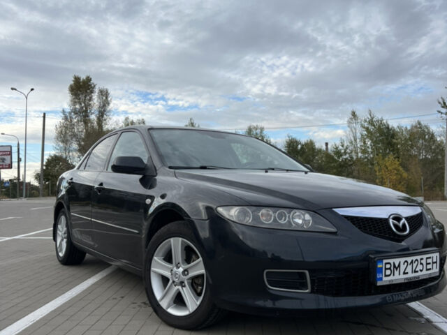 Черный Мазда 6, объемом двигателя 2 л и пробегом 128 тыс. км за 6000 $, фото 1 на Automoto.ua