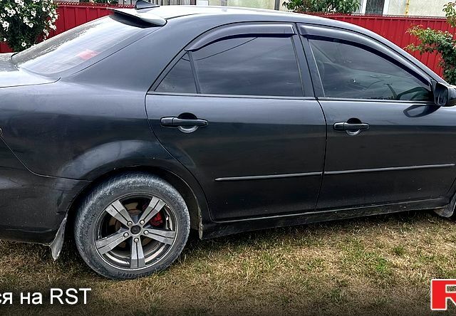 Чорний Мазда 6, об'ємом двигуна 2 л та пробігом 223 тис. км за 4000 $, фото 1 на Automoto.ua