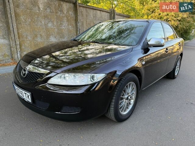 Черный Мазда 6, объемом двигателя 1.8 л и пробегом 307 тыс. км за 2300 $, фото 1 на Automoto.ua