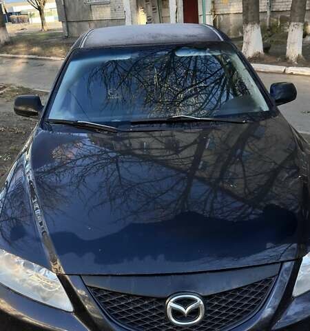 Черный Мазда 6, объемом двигателя 2.01 л и пробегом 196 тыс. км за 4500 $, фото 1 на Automoto.ua