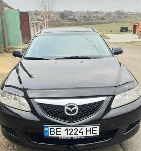 Черный Мазда 6, объемом двигателя 2 л и пробегом 243 тыс. км за 4700 $, фото 1 на Automoto.ua