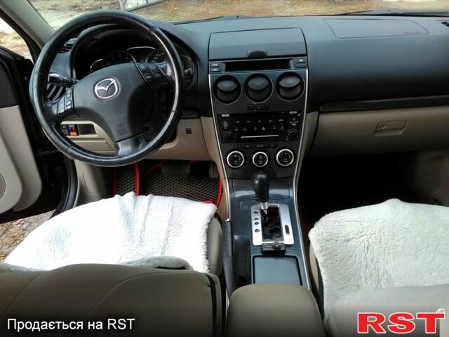 Чорний Мазда 6, об'ємом двигуна 2 л та пробігом 241 тис. км за 4100 $, фото 1 на Automoto.ua