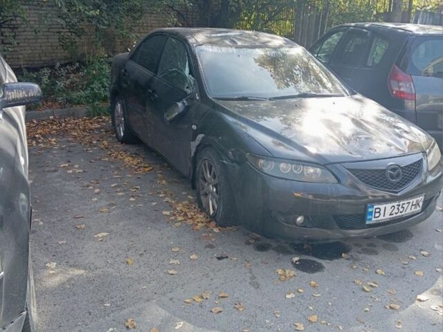 Черный Мазда 6, объемом двигателя 2 л и пробегом 250 тыс. км за 1601 $, фото 1 на Automoto.ua