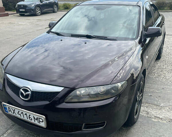 Черный Мазда 6, объемом двигателя 1.8 л и пробегом 248 тыс. км за 5300 $, фото 1 на Automoto.ua
