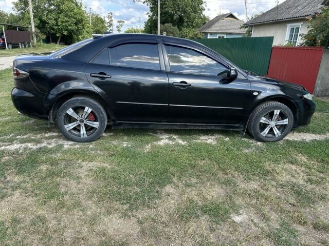 Чорний Мазда 6, об'ємом двигуна 2 л та пробігом 223 тис. км за 3712 $, фото 1 на Automoto.ua