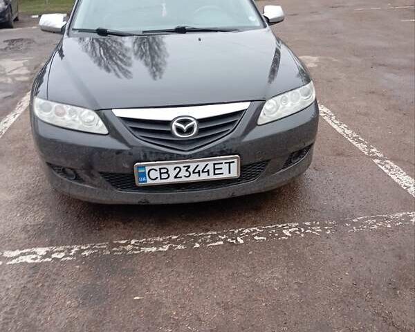 Черный Мазда 6, объемом двигателя 2 л и пробегом 199 тыс. км за 3500 $, фото 1 на Automoto.ua