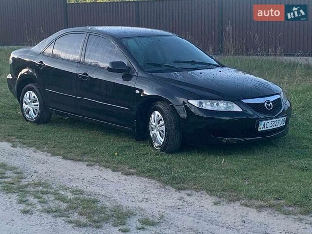 Черный Мазда 6, объемом двигателя 1.82 л и пробегом 300 тыс. км за 2150 $, фото 1 на Automoto.ua