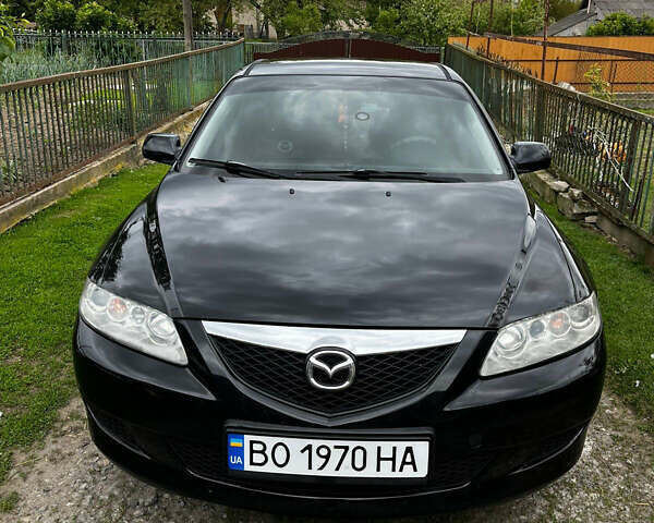 Черный Мазда 6, объемом двигателя 1.8 л и пробегом 210 тыс. км за 4500 $, фото 1 на Automoto.ua
