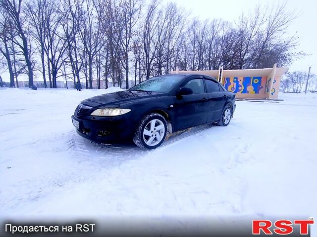 Черный Мазда 6, объемом двигателя 2 л и пробегом 260 тыс. км за 4550 $, фото 1 на Automoto.ua