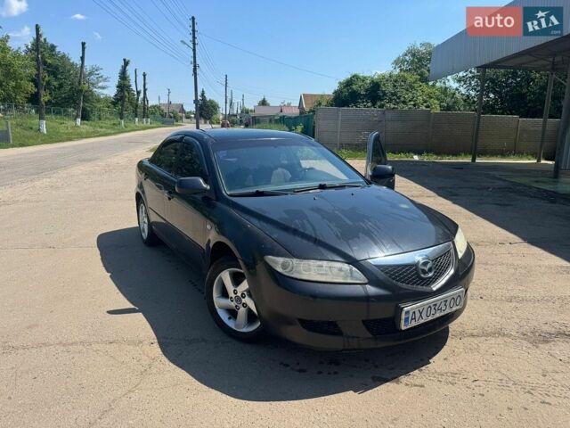 Черный Мазда 6, объемом двигателя 1.8 л и пробегом 150 тыс. км за 2450 $, фото 1 на Automoto.ua