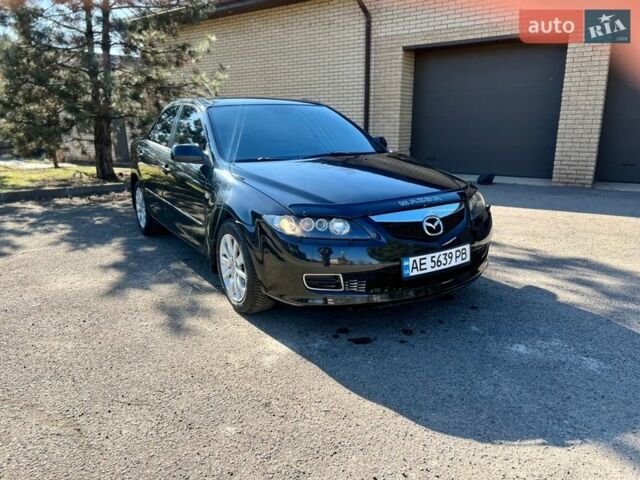 Черный Мазда 6, объемом двигателя 2 л и пробегом 225 тыс. км за 4750 $, фото 1 на Automoto.ua