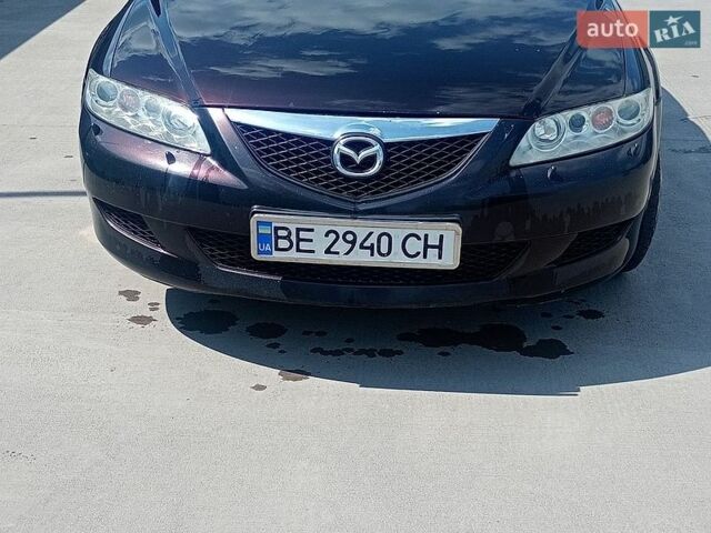 Черный Мазда 6, объемом двигателя 2 л и пробегом 207 тыс. км за 3500 $, фото 1 на Automoto.ua