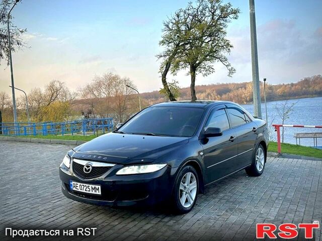 Черный Мазда 6, объемом двигателя 2 л и пробегом 190 тыс. км за 3950 $, фото 1 на Automoto.ua