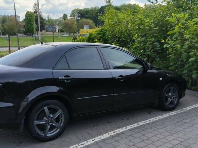 Чорний Мазда 6, об'ємом двигуна 2 л та пробігом 329 тис. км за 4300 $, фото 1 на Automoto.ua