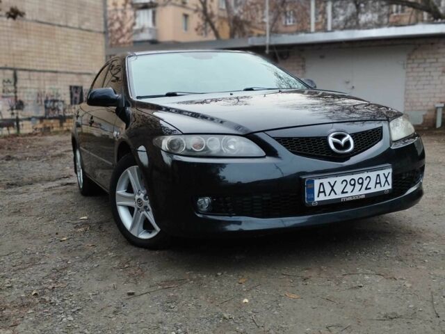 Черный Мазда 6, объемом двигателя 2 л и пробегом 185 тыс. км за 5000 $, фото 1 на Automoto.ua