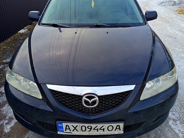Черный Мазда 6, объемом двигателя 2 л и пробегом 300 тыс. км за 2850 $, фото 1 на Automoto.ua