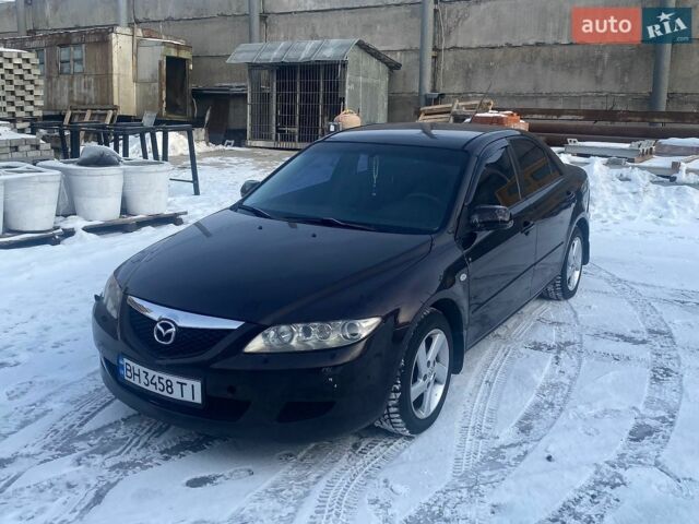 Черный Мазда 6, объемом двигателя 2 л и пробегом 250 тыс. км за 4400 $, фото 1 на Automoto.ua
