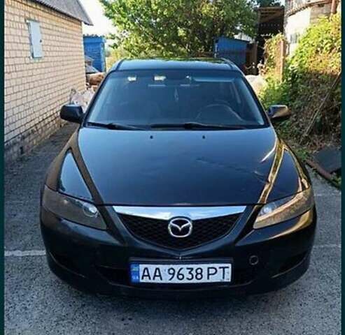 Черный Мазда 6, объемом двигателя 2 л и пробегом 381 тыс. км за 3999 $, фото 1 на Automoto.ua