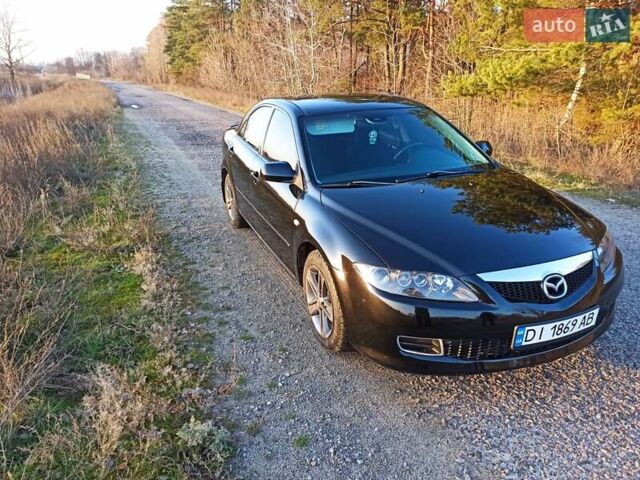 Черный Мазда 6, объемом двигателя 1.8 л и пробегом 200 тыс. км за 4700 $, фото 1 на Automoto.ua