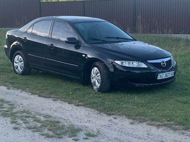 Черный Мазда 6, объемом двигателя 1.82 л и пробегом 300 тыс. км за 2550 $, фото 1 на Automoto.ua