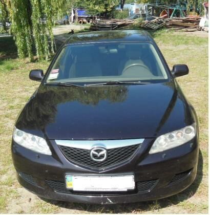 Чорний Мазда 6, об'ємом двигуна 2 л та пробігом 253 тис. км за 6500 $, фото 1 на Automoto.ua