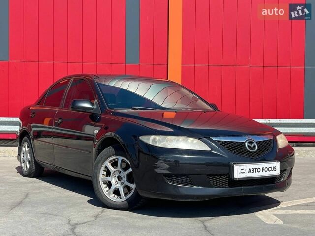 Черный Мазда 6, объемом двигателя 2 л и пробегом 214 тыс. км за 3490 $, фото 1 на Automoto.ua
