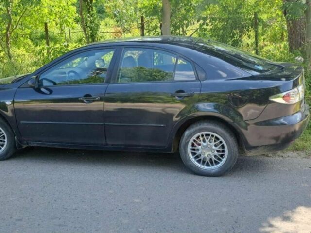 Черный Мазда 6, объемом двигателя 2 л и пробегом 200 тыс. км за 3300 $, фото 1 на Automoto.ua