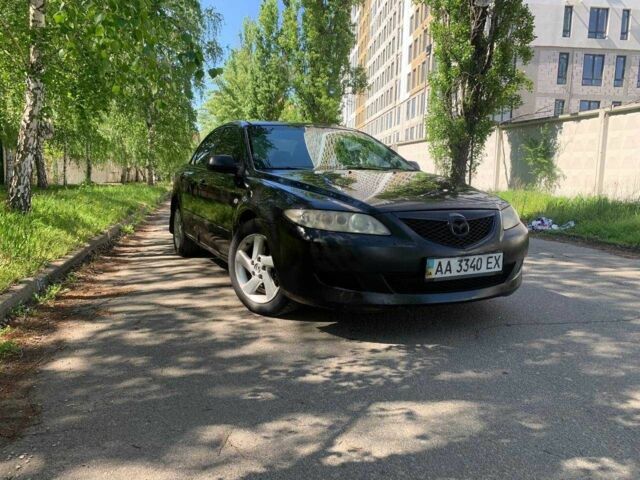 Черный Мазда 6, объемом двигателя 2 л и пробегом 399 тыс. км за 2700 $, фото 1 на Automoto.ua
