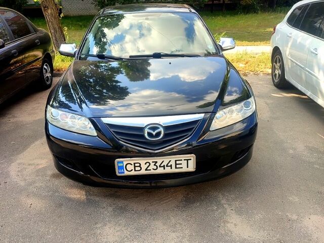 Черный Мазда 6, объемом двигателя 2 л и пробегом 203 тыс. км за 5300 $, фото 1 на Automoto.ua