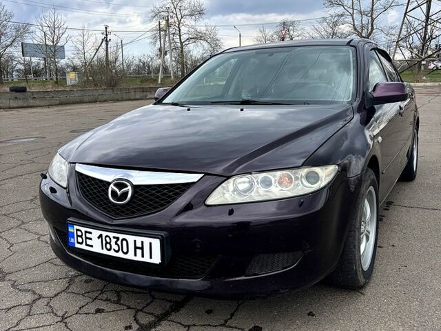 Черный Мазда 6, объемом двигателя 2 л и пробегом 410 тыс. км за 4200 $, фото 1 на Automoto.ua