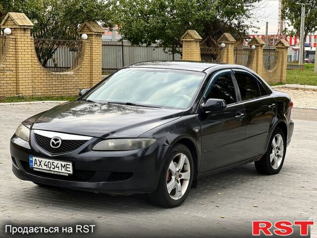 Черный Мазда 6, объемом двигателя 2.3 л и пробегом 250 тыс. км за 3300 $, фото 1 на Automoto.ua