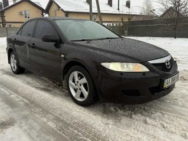 Чорний Мазда 6, об'ємом двигуна 2 л та пробігом 248 тис. км за 1850 $, фото 1 на Automoto.ua
