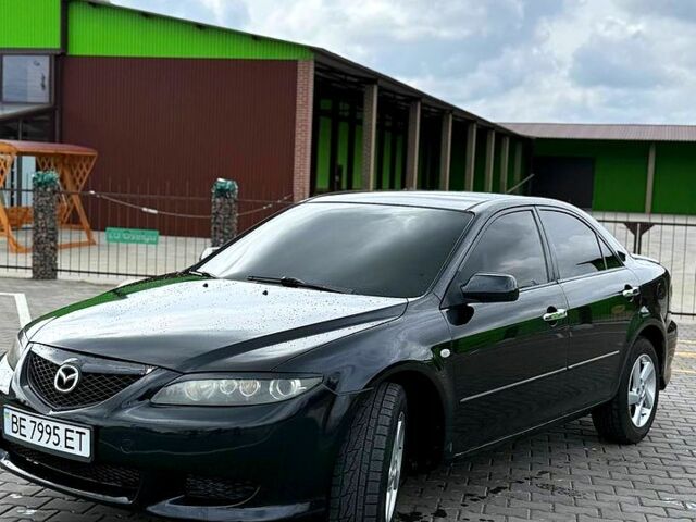 Черный Мазда 6, объемом двигателя 2 л и пробегом 280 тыс. км за 4200 $, фото 1 на Automoto.ua