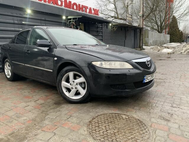 Черный Мазда 6, объемом двигателя 2 л и пробегом 215 тыс. км за 2950 $, фото 1 на Automoto.ua