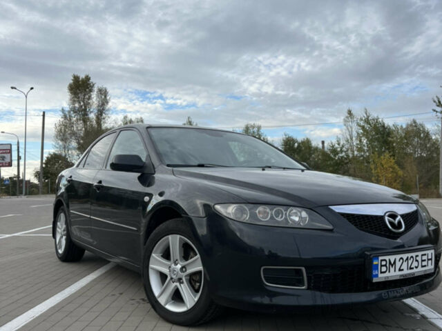 Черный Мазда 6, объемом двигателя 2 л и пробегом 128 тыс. км за 6000 $, фото 1 на Automoto.ua