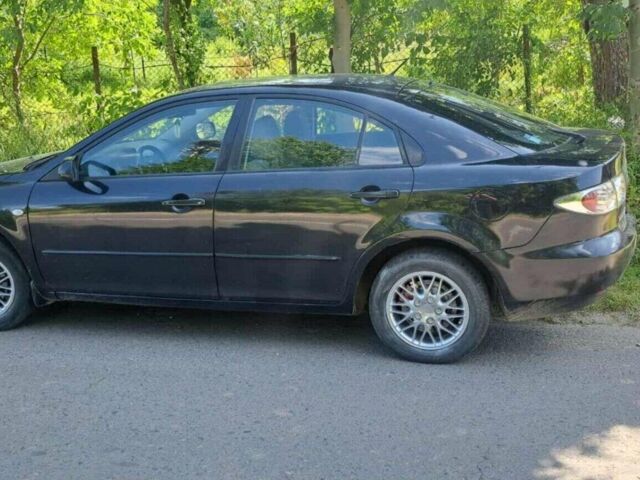 Чорний Мазда 6, об'ємом двигуна 2 л та пробігом 200 тис. км за 3300 $, фото 1 на Automoto.ua