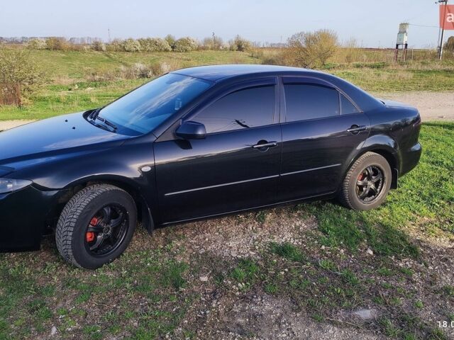 Чорний Мазда 6, об'ємом двигуна 1.8 л та пробігом 333 тис. км за 3650 $, фото 1 на Automoto.ua