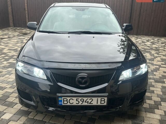 Черный Мазда 6, объемом двигателя 2 л и пробегом 309 тыс. км за 5300 $, фото 1 на Automoto.ua