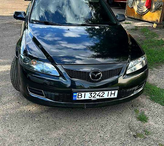 Черный Мазда 6, объемом двигателя 2 л и пробегом 284 тыс. км за 5400 $, фото 1 на Automoto.ua