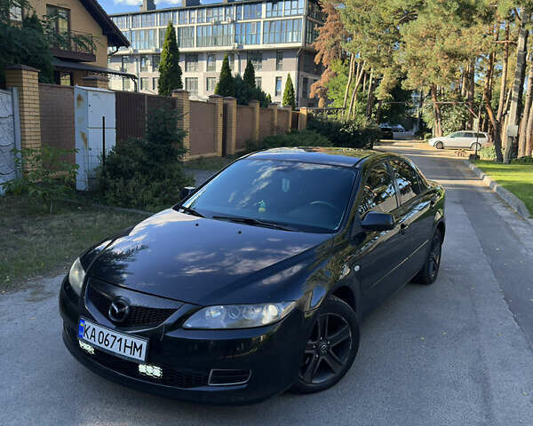 Черный Мазда 6, объемом двигателя 2 л и пробегом 276 тыс. км за 4800 $, фото 1 на Automoto.ua