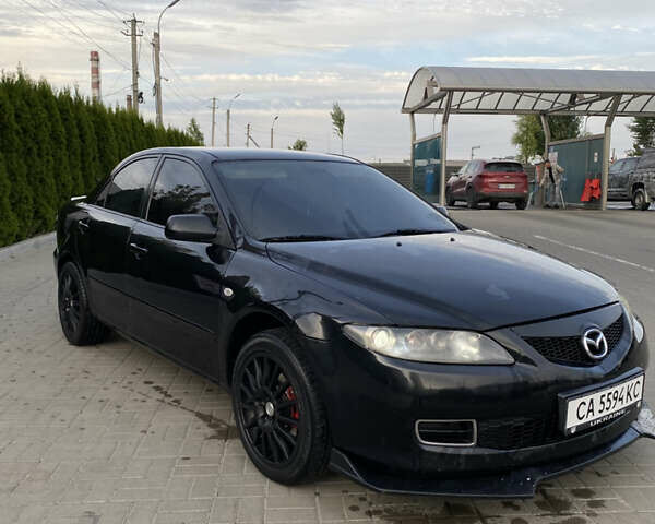 Черный Мазда 6, объемом двигателя 2 л и пробегом 320 тыс. км за 5350 $, фото 1 на Automoto.ua