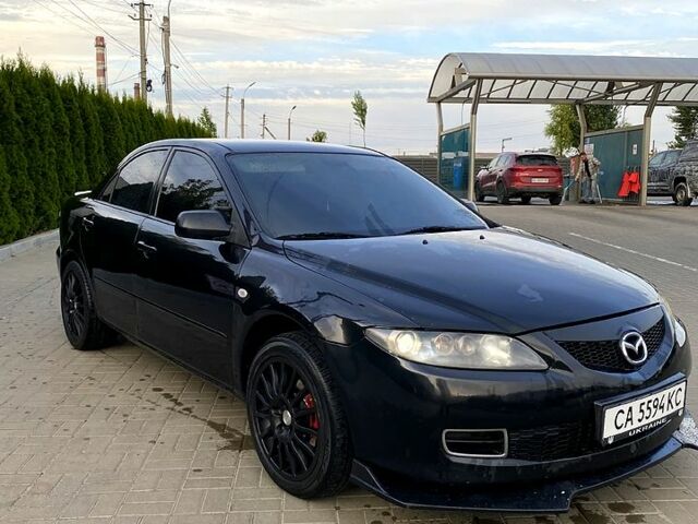 Черный Мазда 6, объемом двигателя 2 л и пробегом 320 тыс. км за 5350 $, фото 1 на Automoto.ua