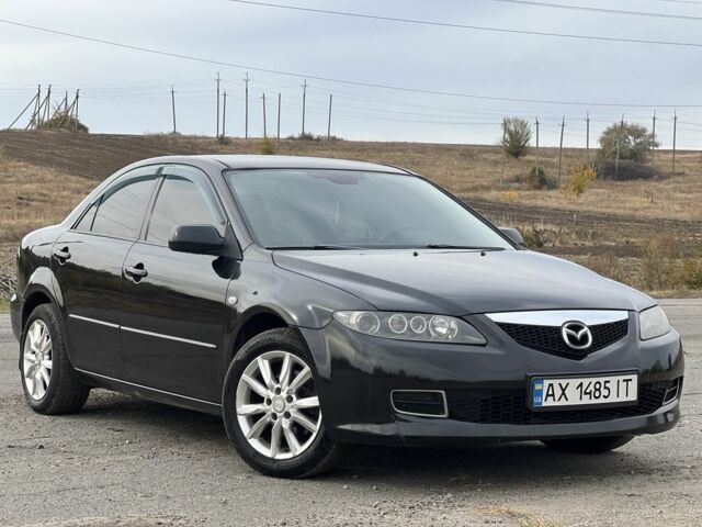 Черный Мазда 6, объемом двигателя 2 л и пробегом 266 тыс. км за 4950 $, фото 1 на Automoto.ua