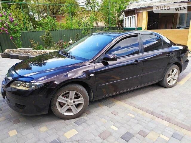 Чорний Мазда 6, об'ємом двигуна 1.8 л та пробігом 211 тис. км за 5200 $, фото 1 на Automoto.ua