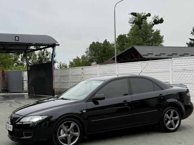 Черный Мазда 6, объемом двигателя 2 л и пробегом 225 тыс. км за 4100 $, фото 1 на Automoto.ua