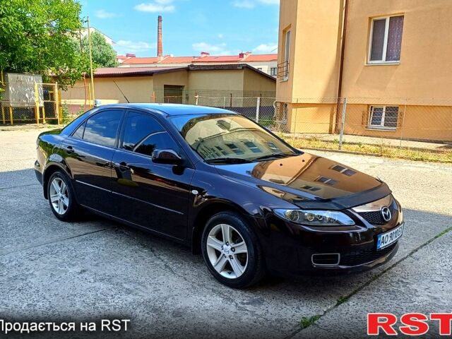 Черный Мазда 6, объемом двигателя 1.8 л и пробегом 300 тыс. км за 4700 $, фото 1 на Automoto.ua