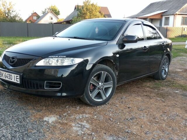 Черный Мазда 6, объемом двигателя 2 л и пробегом 350 тыс. км за 4300 $, фото 1 на Automoto.ua
