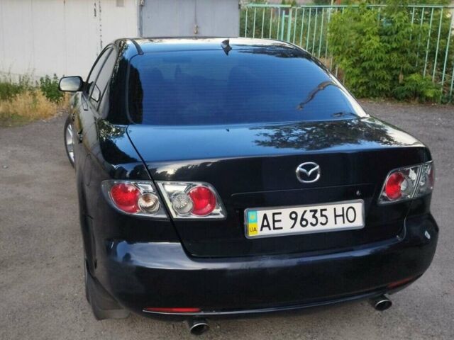 Черный Мазда 6, объемом двигателя 2 л и пробегом 212 тыс. км за 4700 $, фото 1 на Automoto.ua